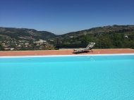 CASALE IN SASSO CON DEPENDANCE E PISCINA